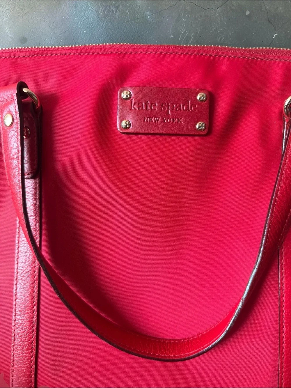 Vibrant red Kate spade laptop tote bag